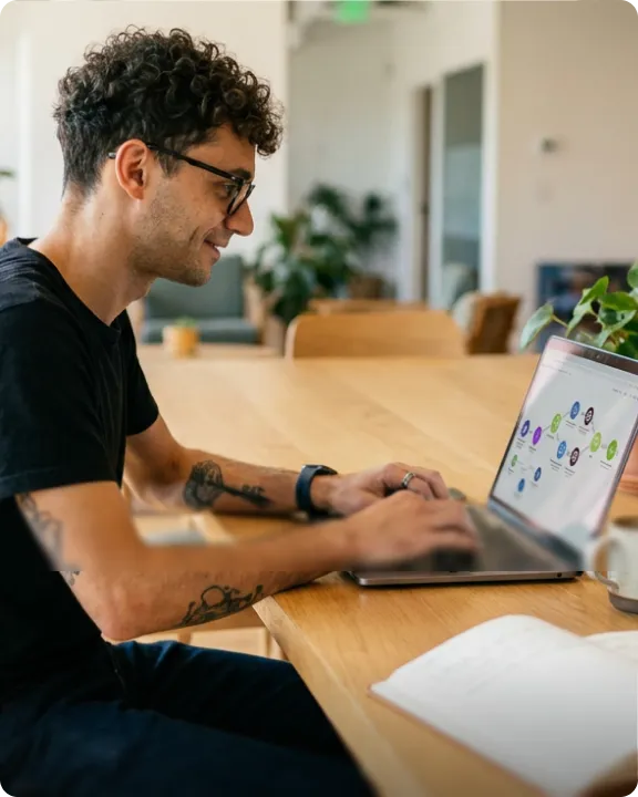 Marketer working on a laptop in an office