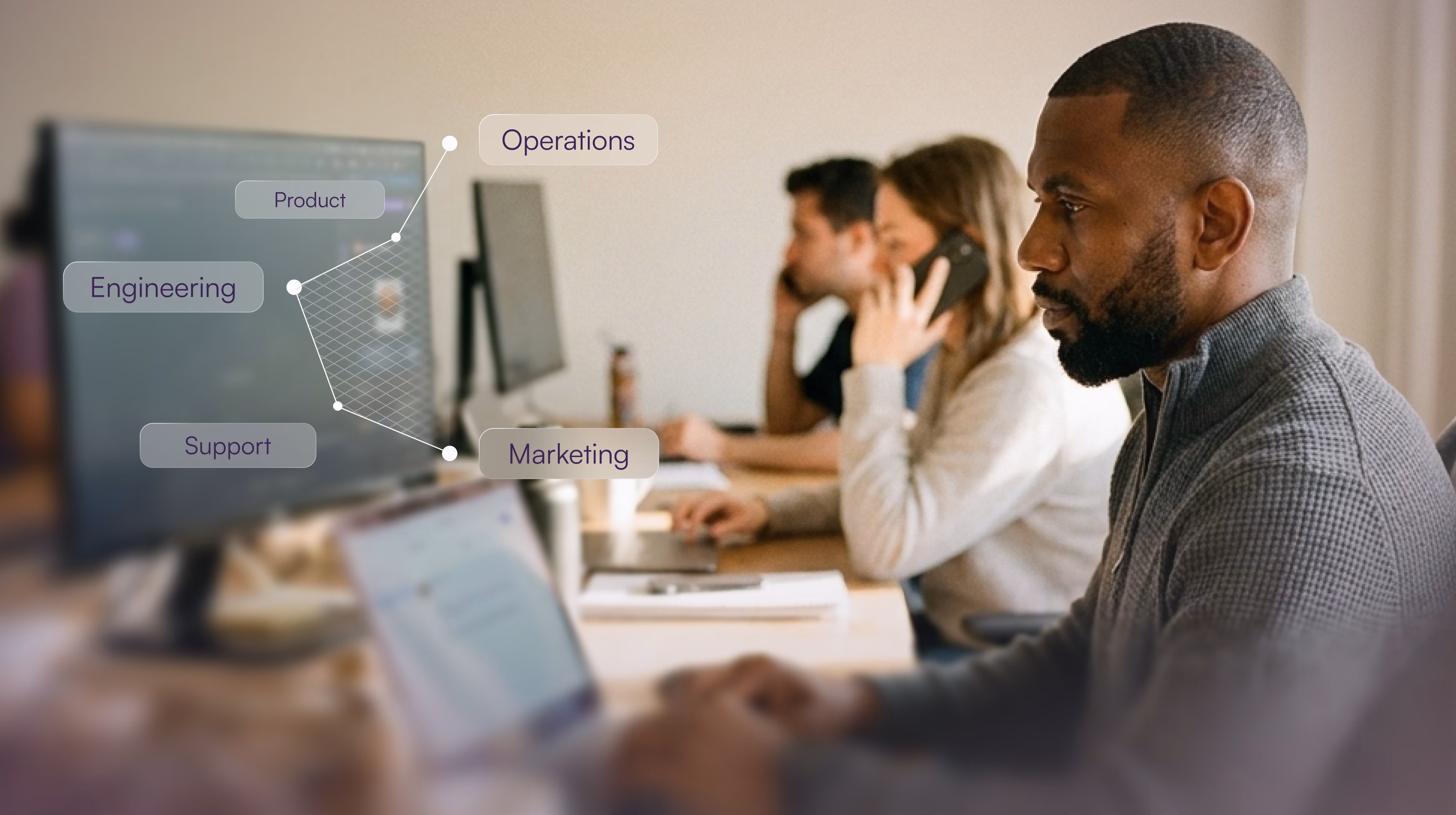 Team lead following his team's automations on screen