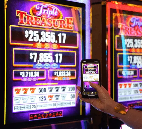 Triple Treasure slot machine with progressive jackpot and mobile app display