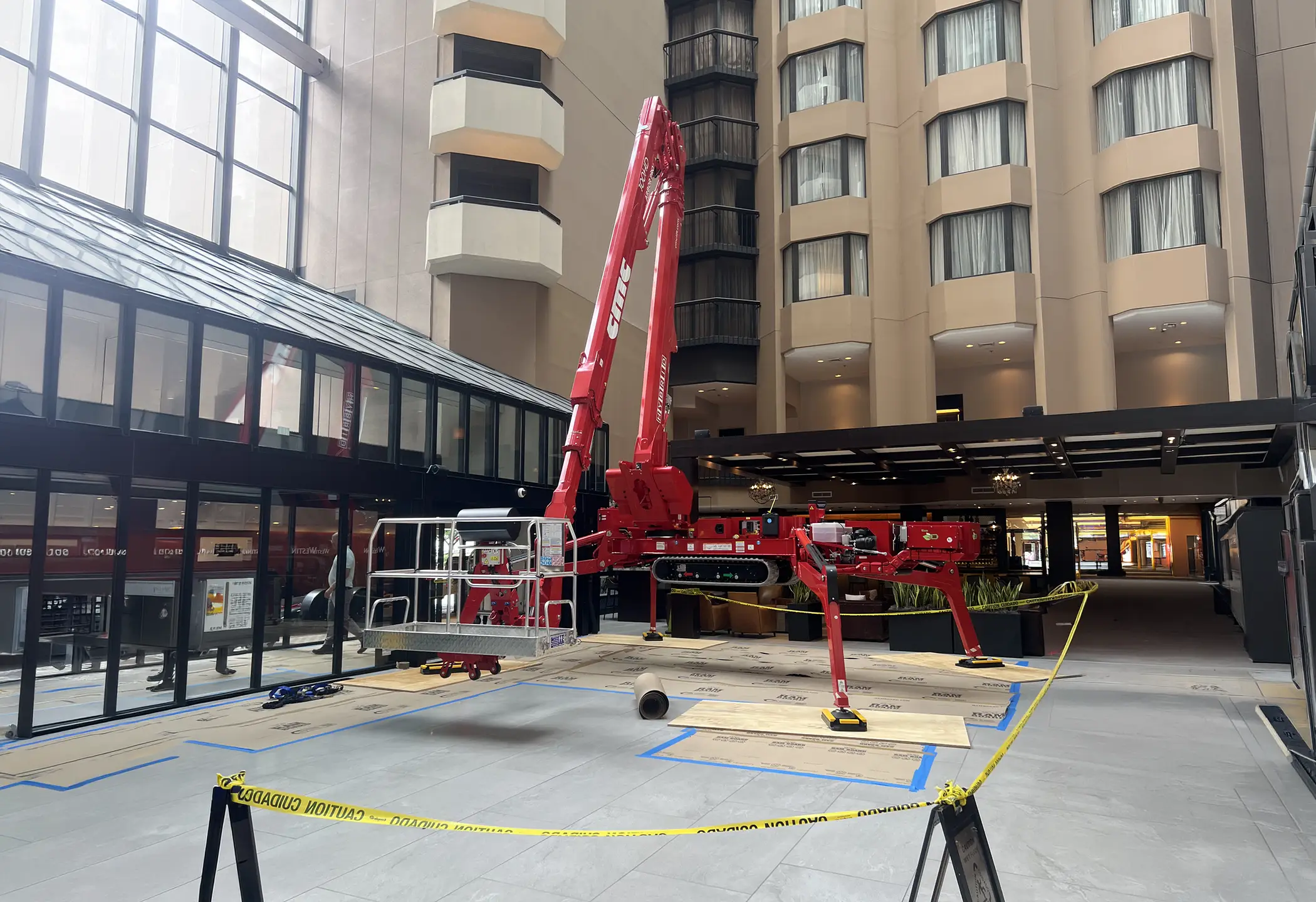 hotel maintenance with CMC 100 ft spider lift
