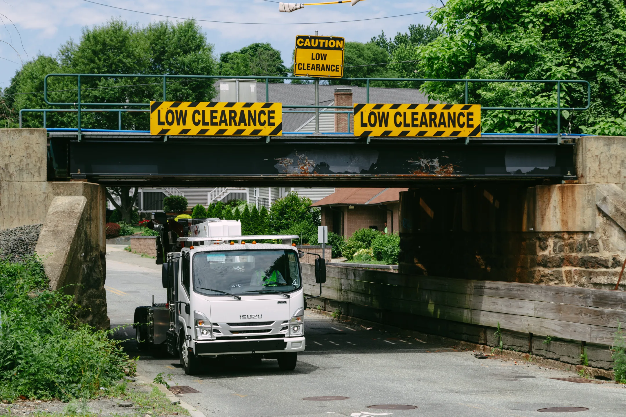 Avoid bucket truck clearance issues