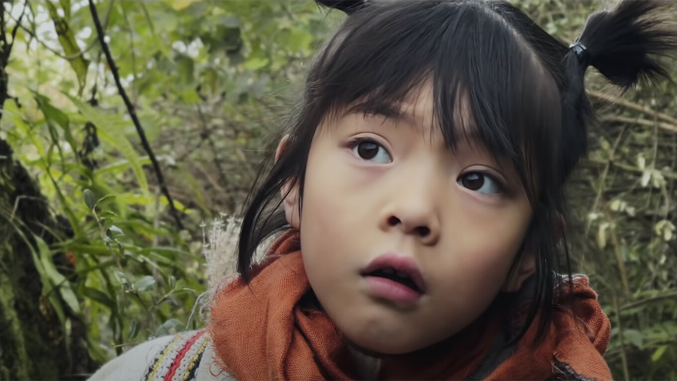 A girl is seeing something