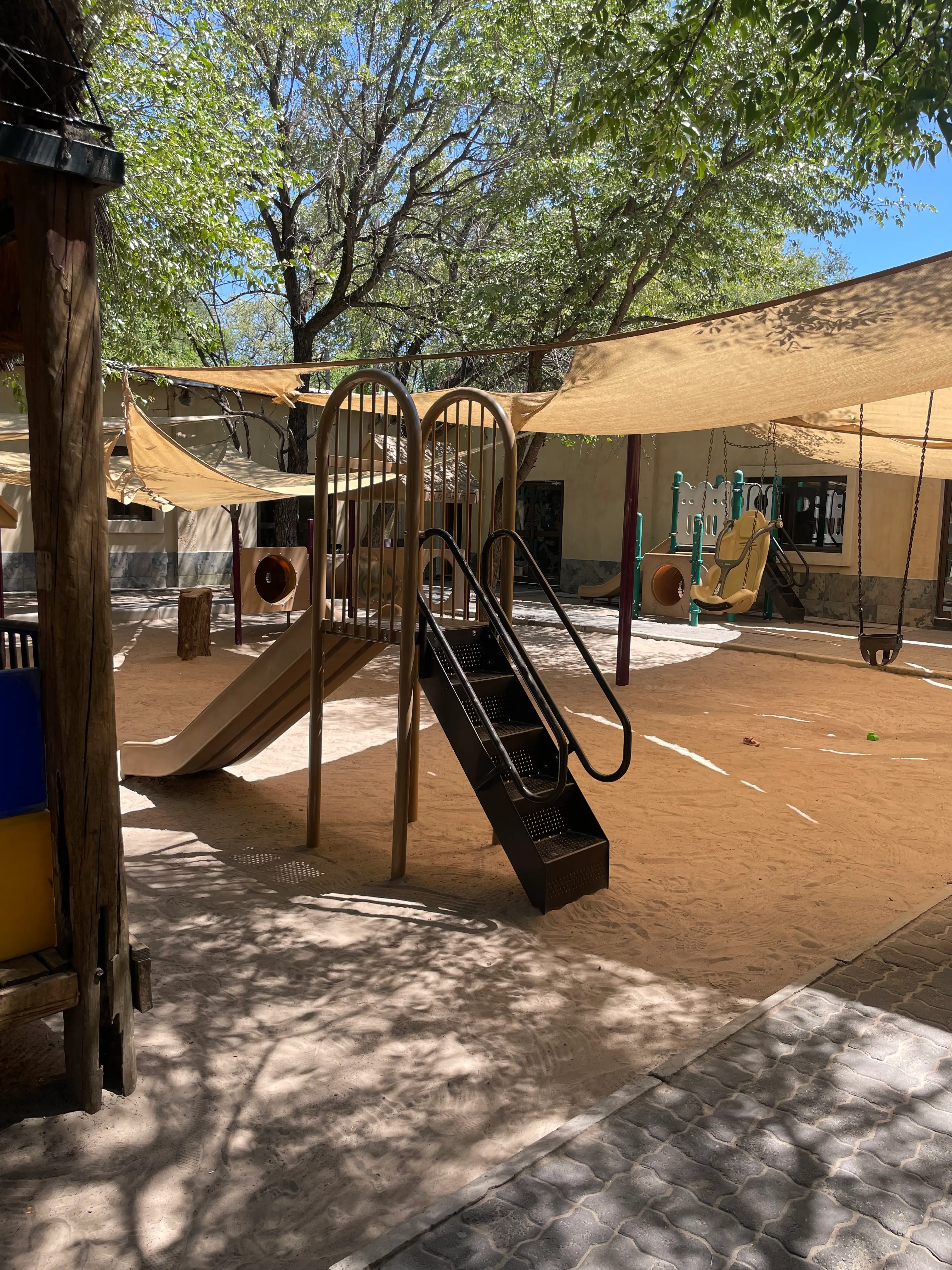 The shaded playground at Lorato House