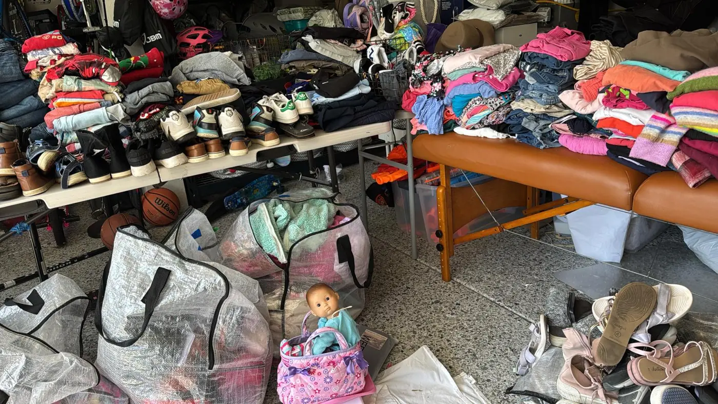 Donated clothing and shoes sorted for families