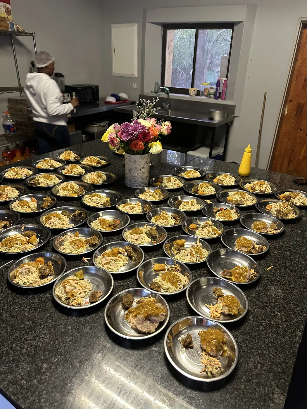 Plated meals ready to be served in the Lorato House kitchen