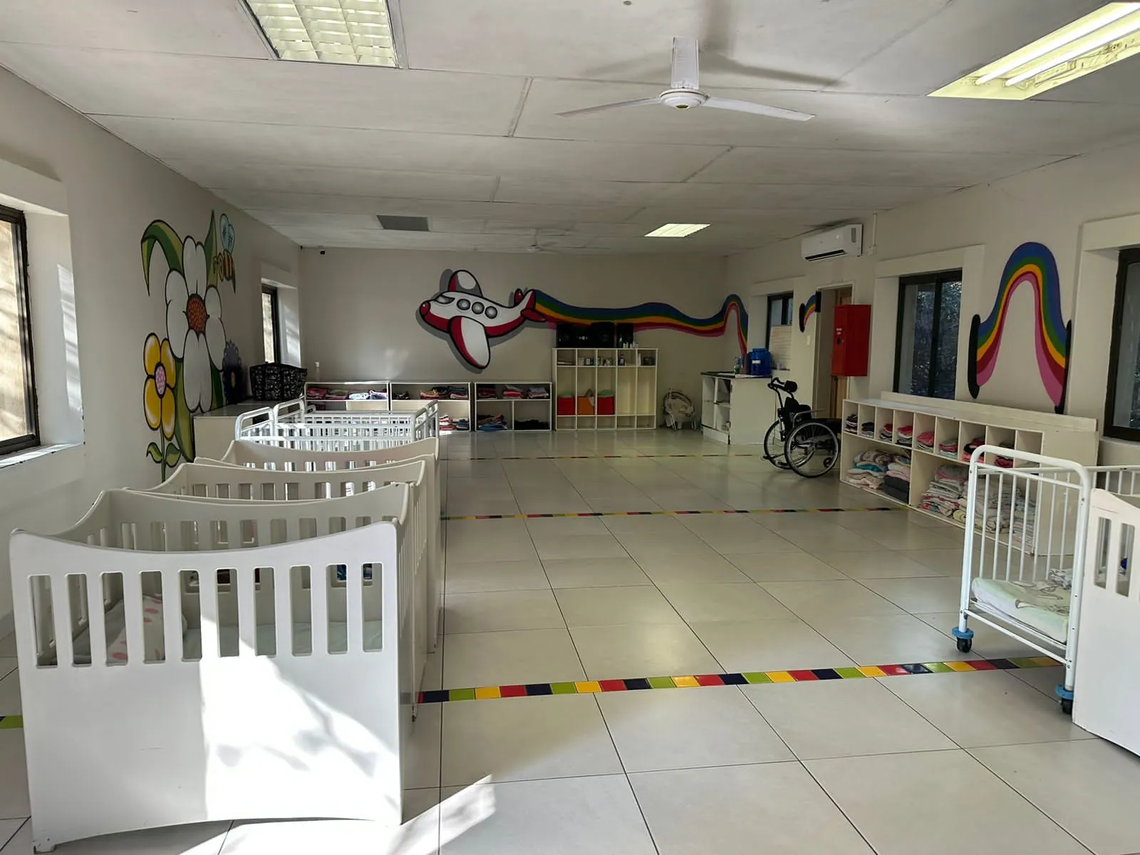 The nursery at Lorato House with rows of cots