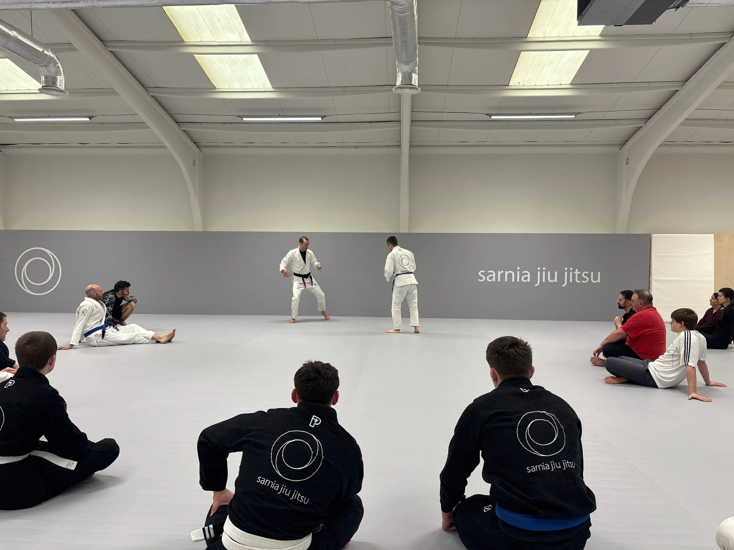 Two people demonstrating a technique at Sarnia Jiu Jitsu