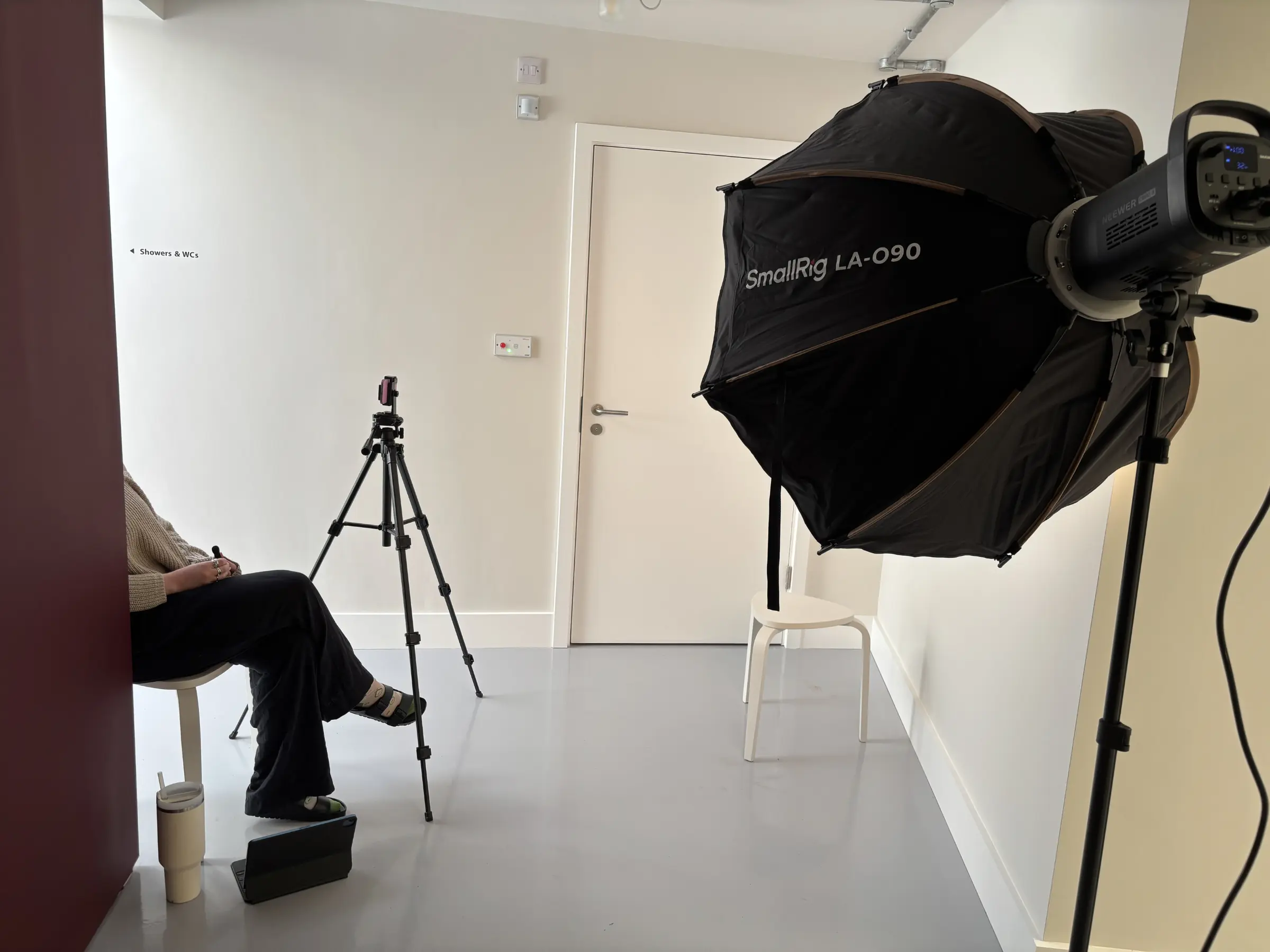 Daizee sat at Sarnia Jiu Jitsu with with camera and lighting set up ready to do an interview