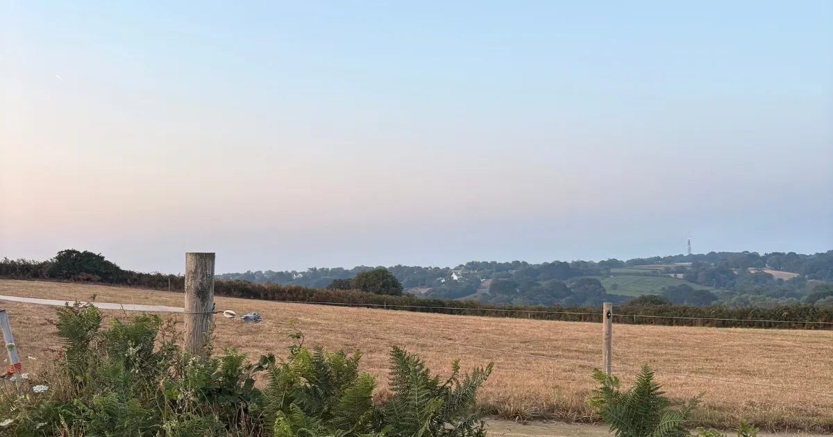 View of St Saviours with green valley in the background