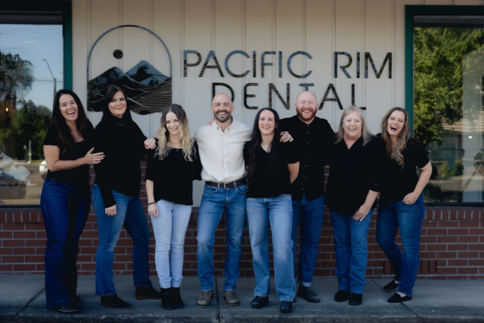 Pacific Rim Dental team standing together outside the Medford practice