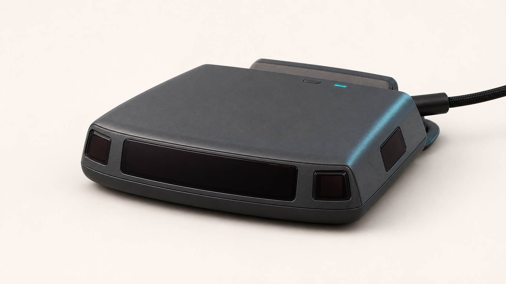 Close render of the BanditKin Sentinel showing the central road-facing panel, four smoked optical receiver windows, top status light, mounting cradle, and USB-C connection.
