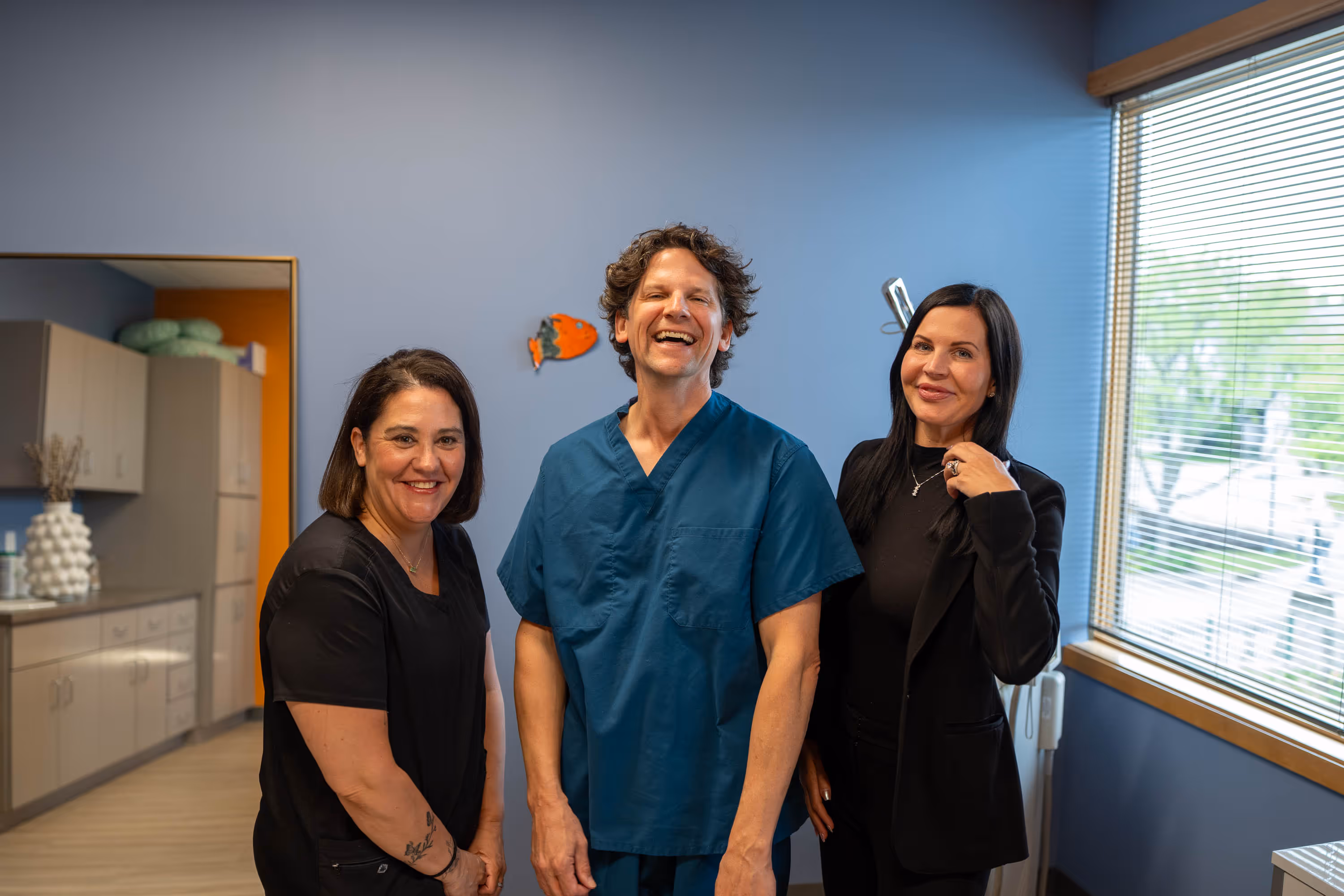 Dr. Daniel Schneider discusses neck lift options with a patient at Riverview Facial Plastic Surgery in St. Paul