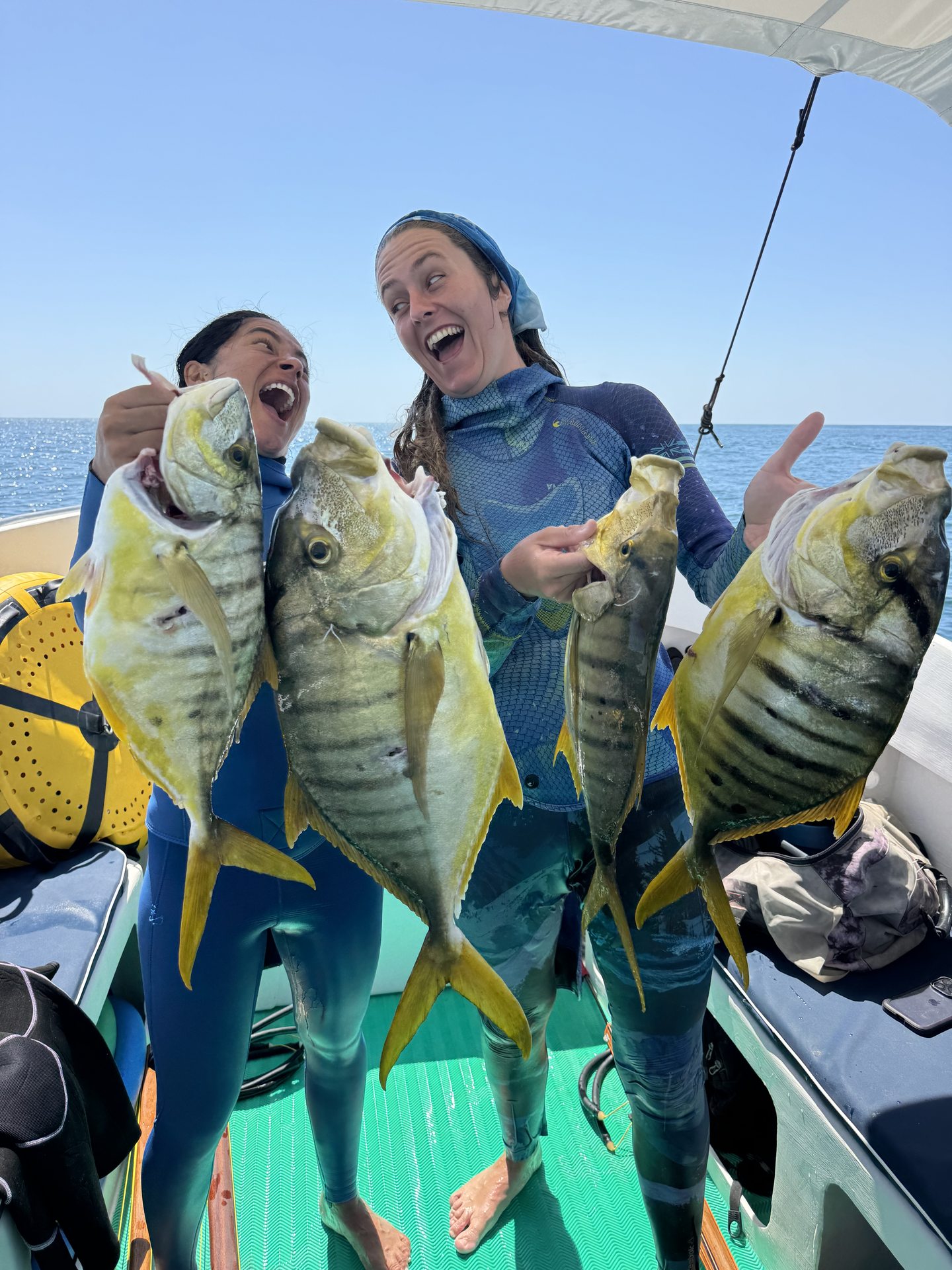 Guests sharing their catches on the boat