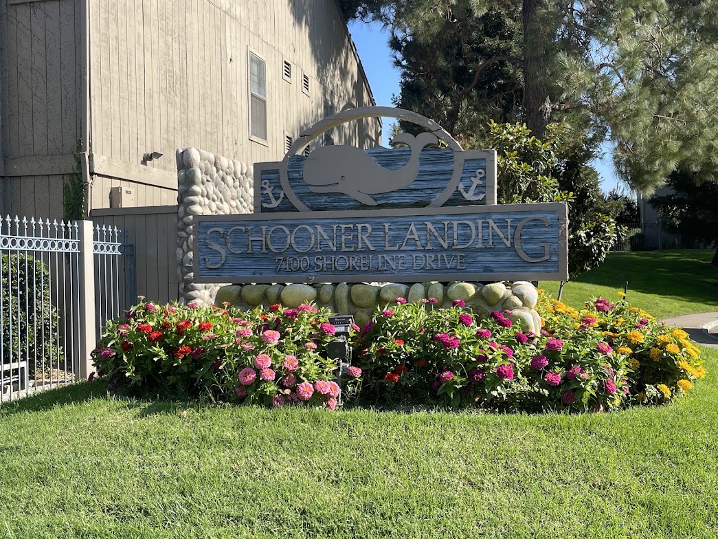 Front entrance signage at Schooner Landing Apartments in Stockton, CA.