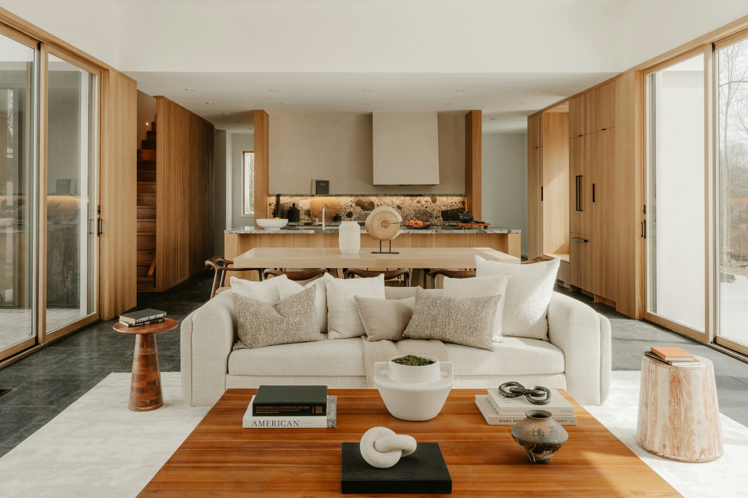 Modern living room with natural wood accents and soft light