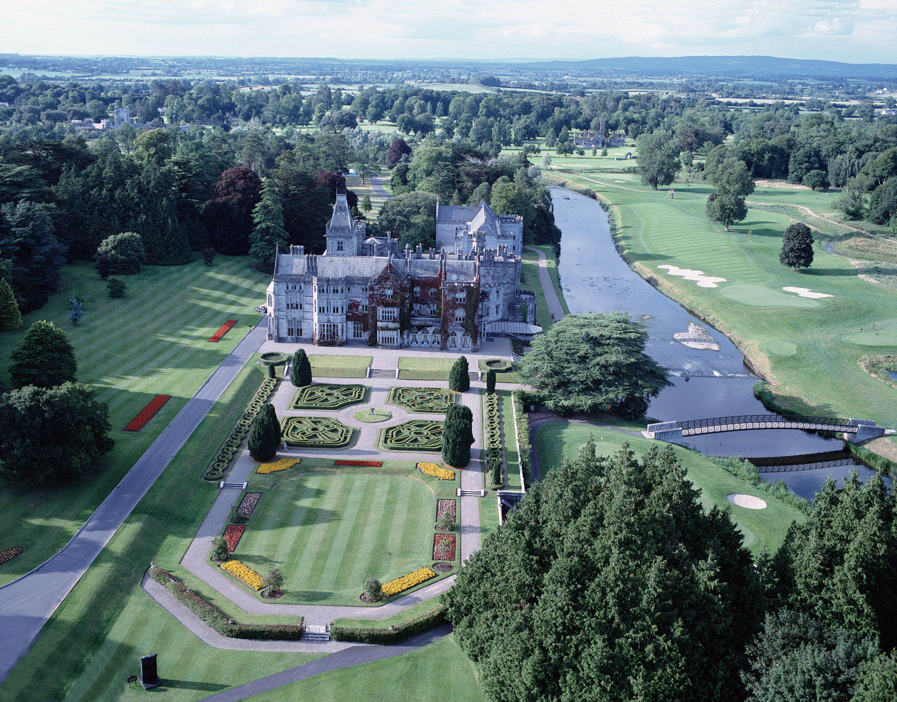 Aerial view of Adare Manor, its formal gardens and the River Maigue
