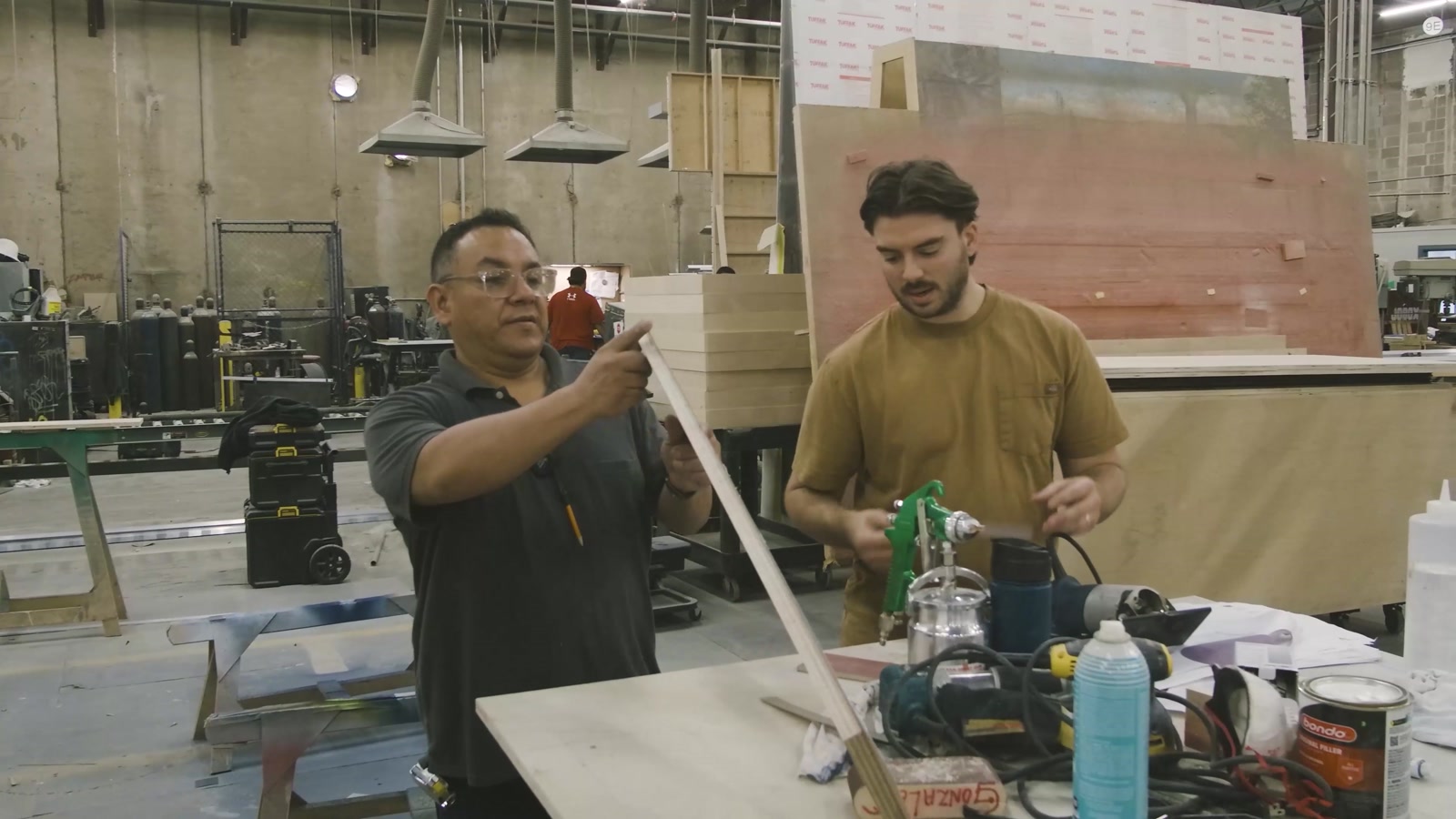 Workshop team assembling the train components