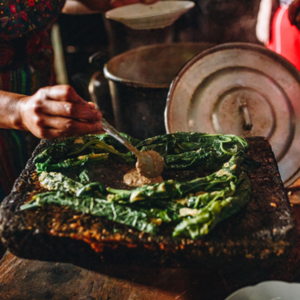 A nutty pumpkin seed sauce being prepared for boxboles