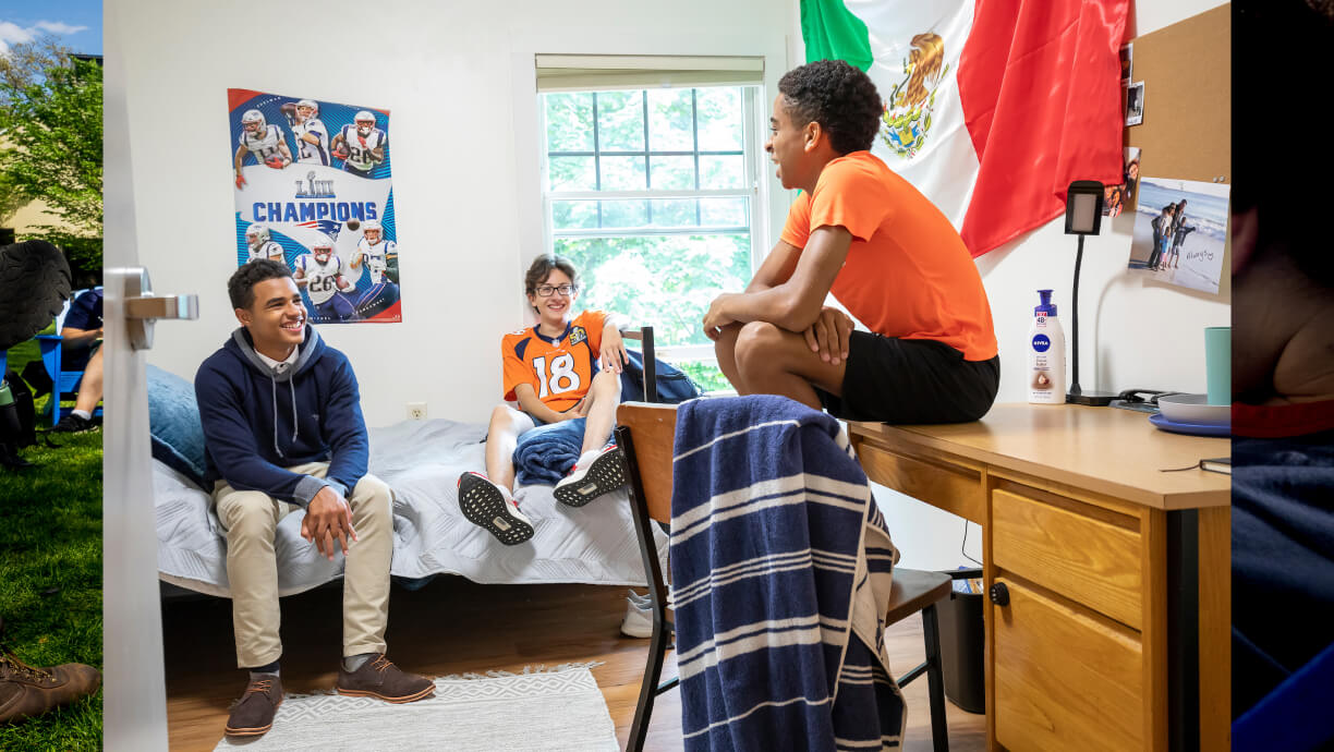 Rectory School (CT) students laughing in their dorm room.