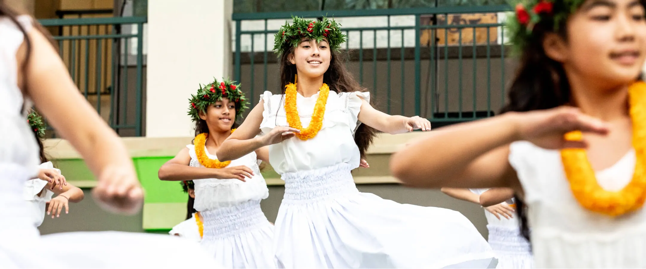 'Iolani School (HI) students conducting a traditional Hawaiian dance.