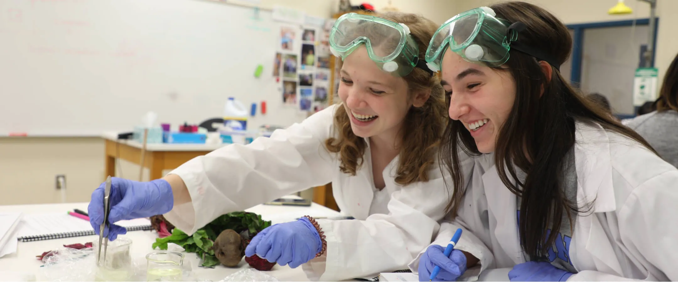 Saint Mary's School (NC) students conducting a science experiment.