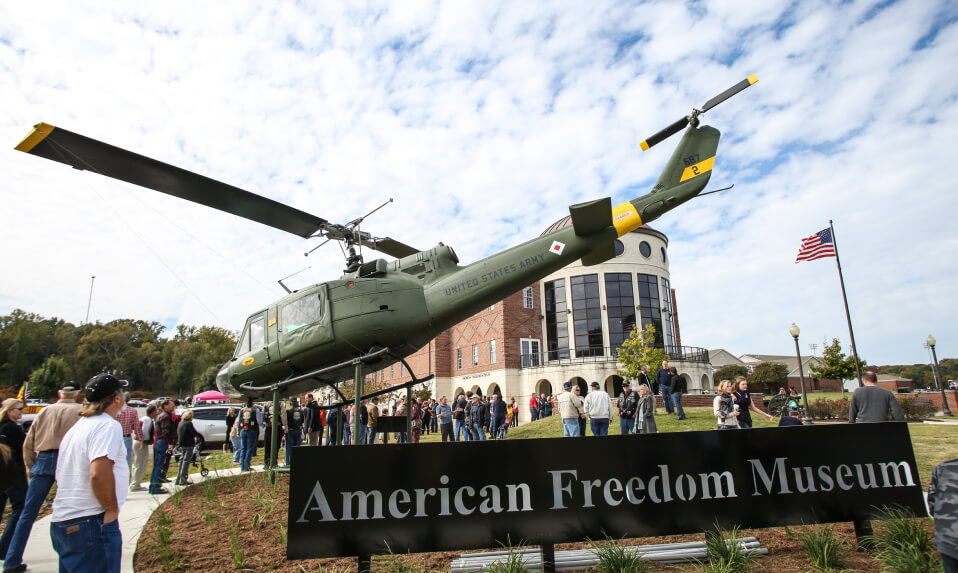A display of an United States Army helicopter outside of The Brook Hill School's American Freedom Museum.