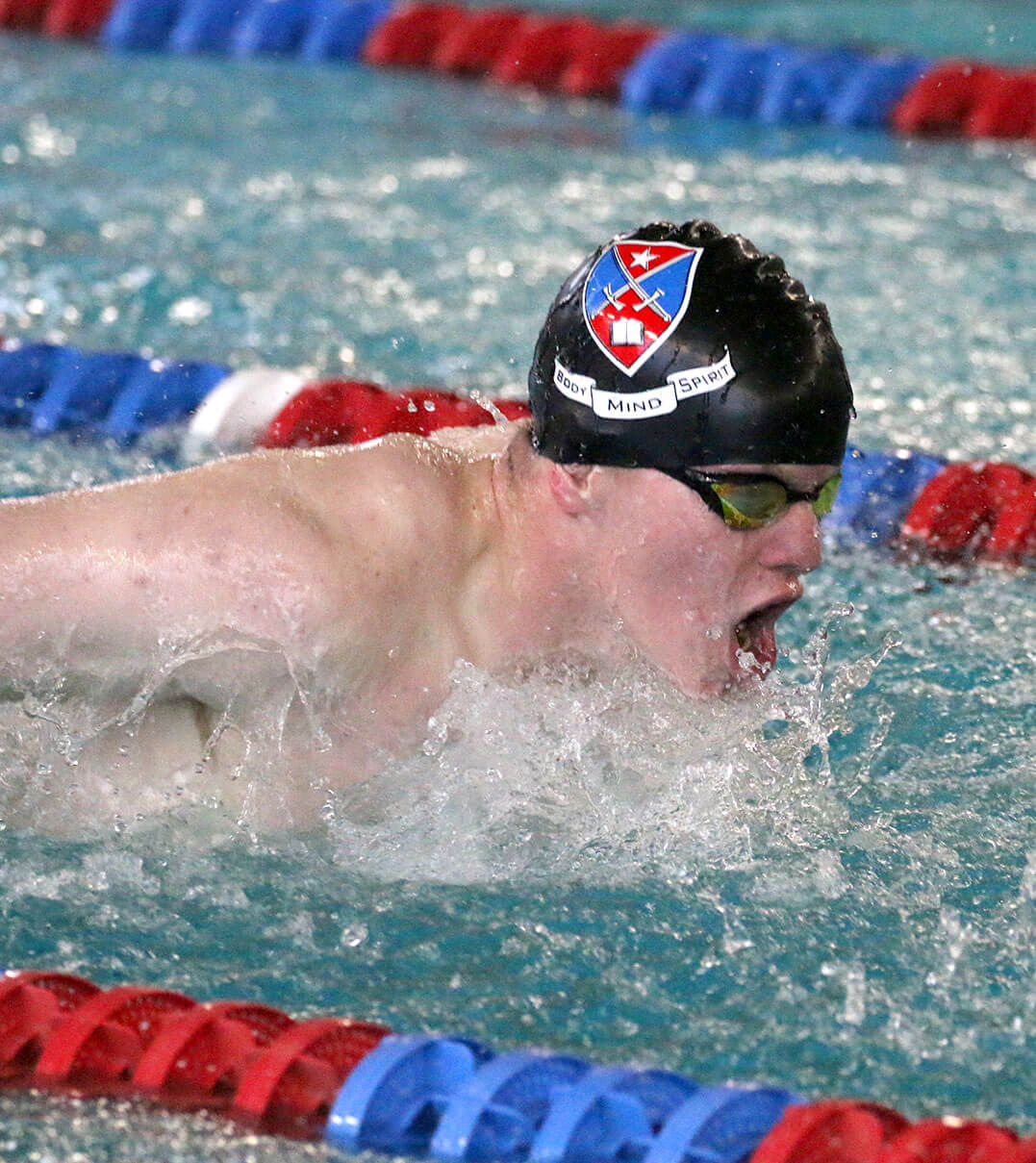 A Fork Union swimmer competing in the breast stroke.