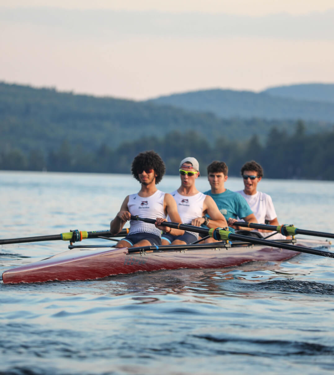 The Brewster rowing team practicing on the lake.