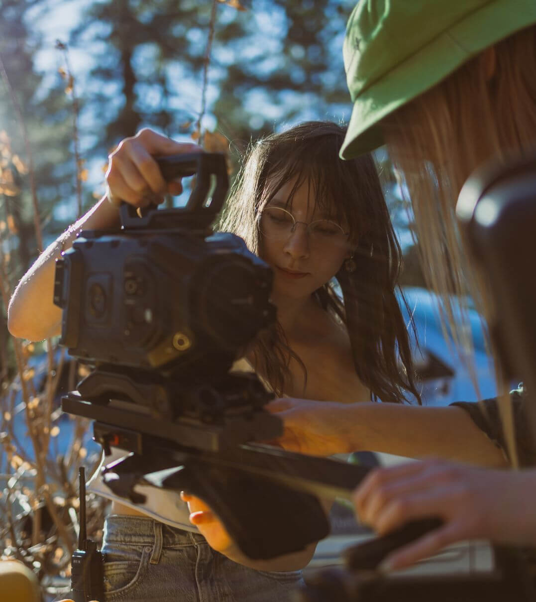 Idyllwild Arts Academy students positioning a video camera.