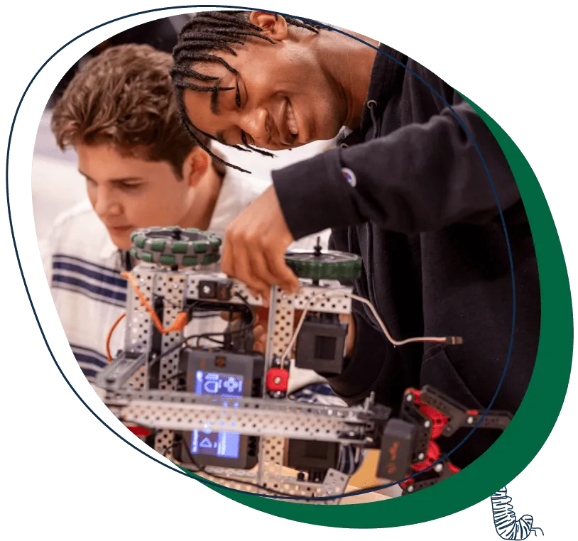 Two Princeton Day School (NJ) students work on a robotics project.