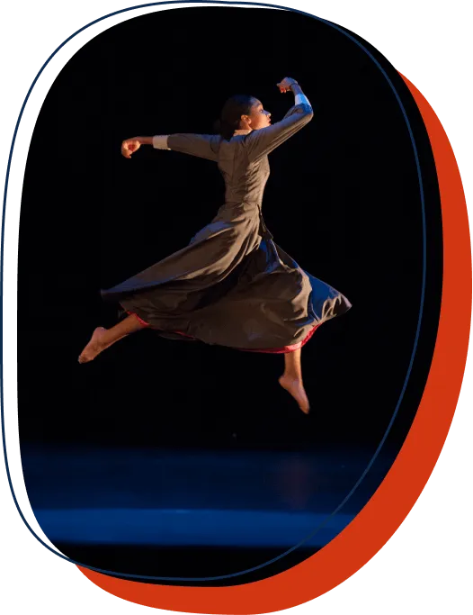 A Taft School (CT) student leaping on stage in a drama performance.