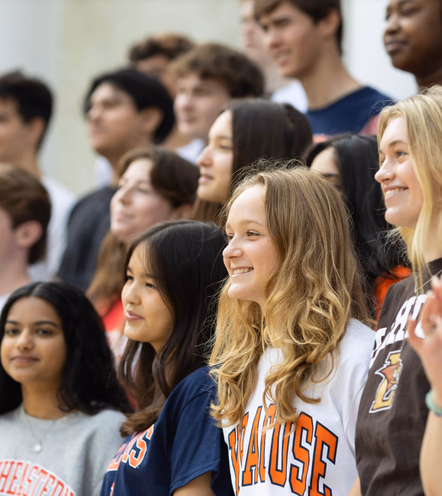 NSCDS students watching an assembly with glee.