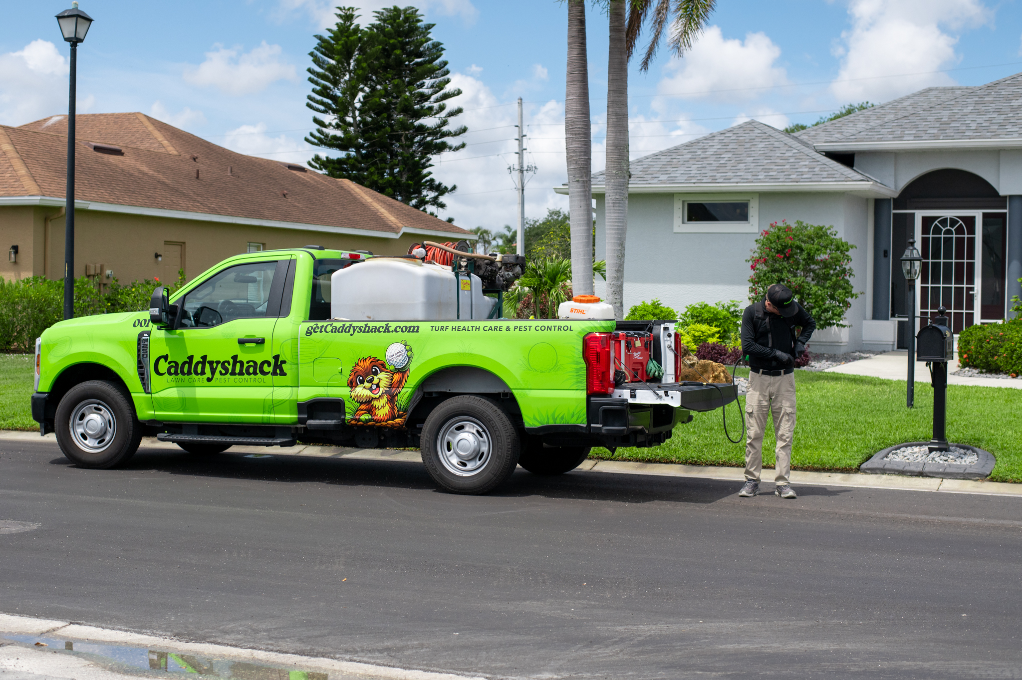 A Caddyshack truck arriving at a client's house in Sarasota