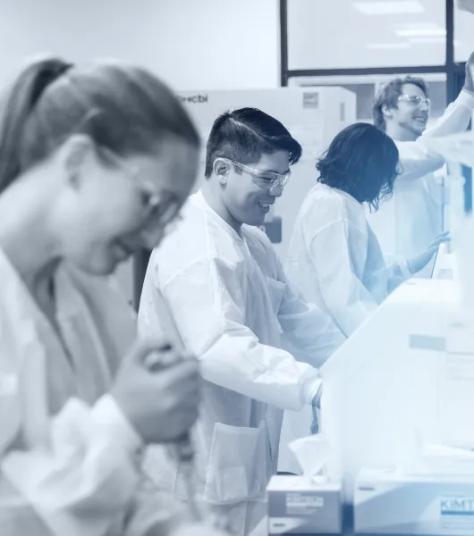 VedaBio scientists working together in the lab