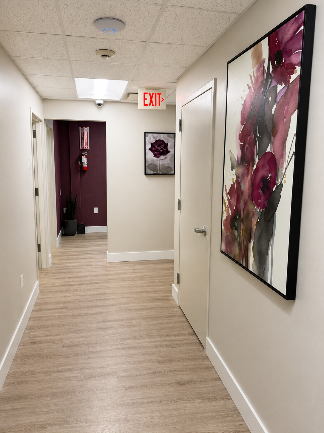 Hallway inside Infuse Care leading to private patient suites
