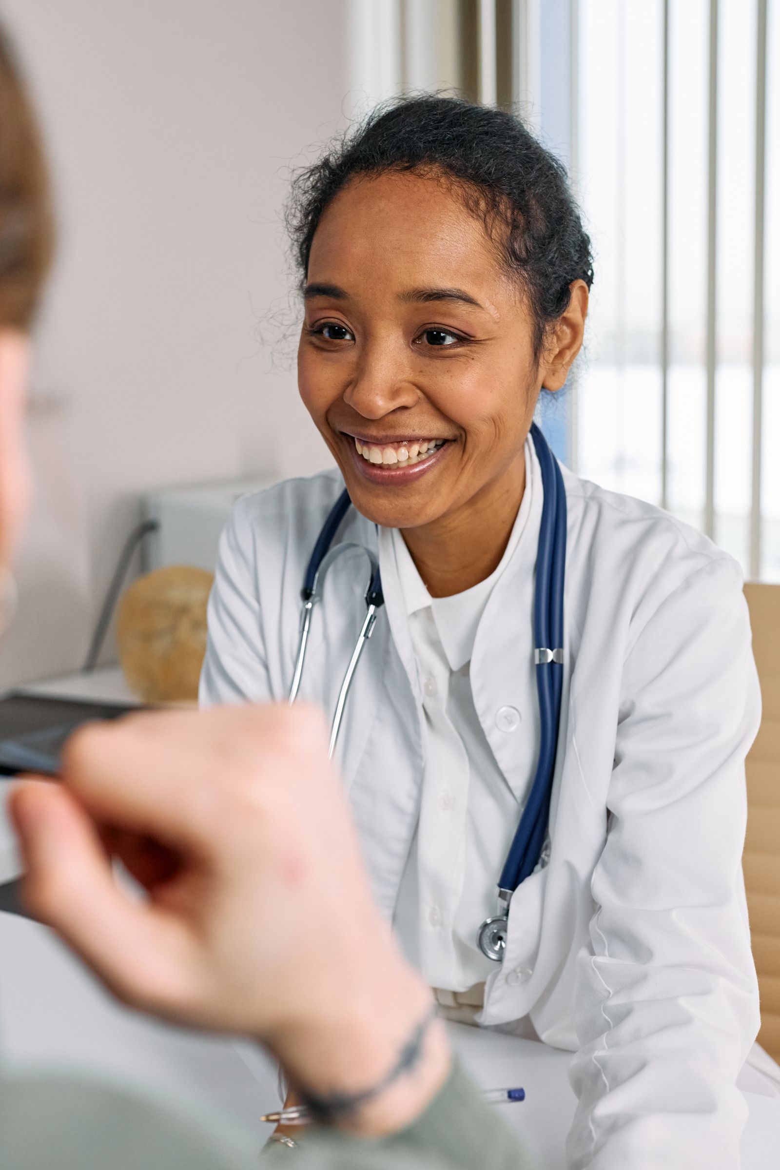 Care provider and patient sharing a trust and reassurance moment