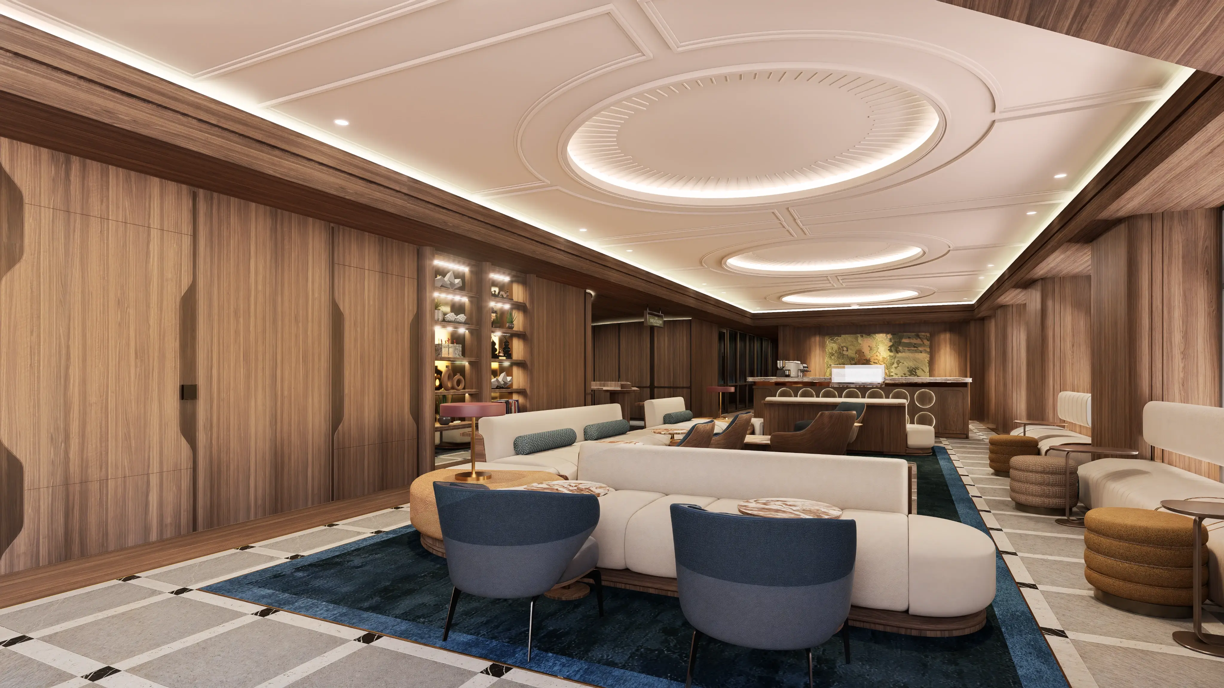 The Great Room's Drawing Room — a grand members' lounge with a coffered circular ceiling, plush white sofas and navy armchairs arranged around a deep blue rug, and a bar counter stretching along the warm wood-panelled walls.