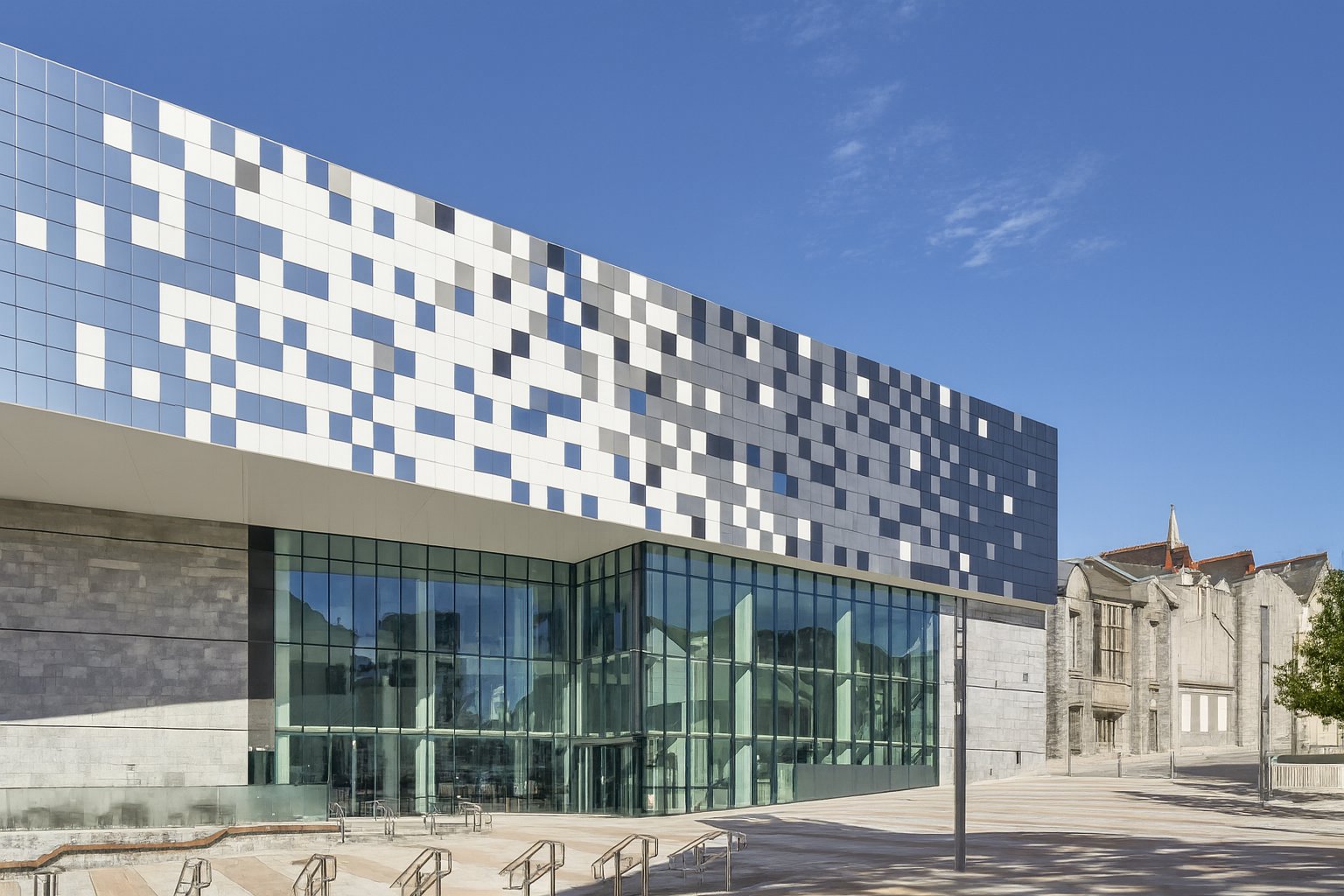 The Box, Plymouth, from the street: the museum’s chequered glass-and-tile facade above its glazed entrance.