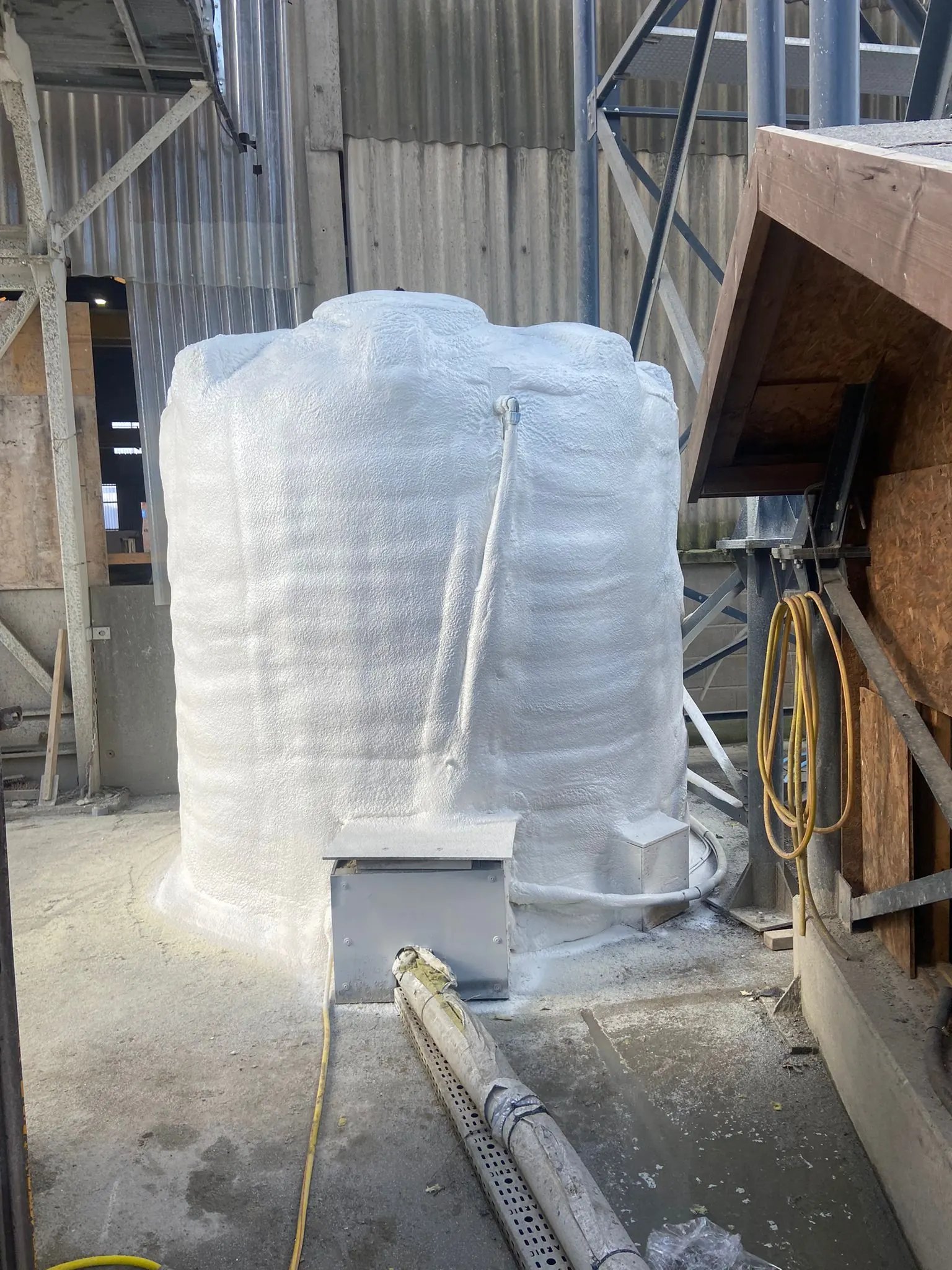 Modular Cubed, Ripon: the ribbed water tank treated with closed-cell foam.