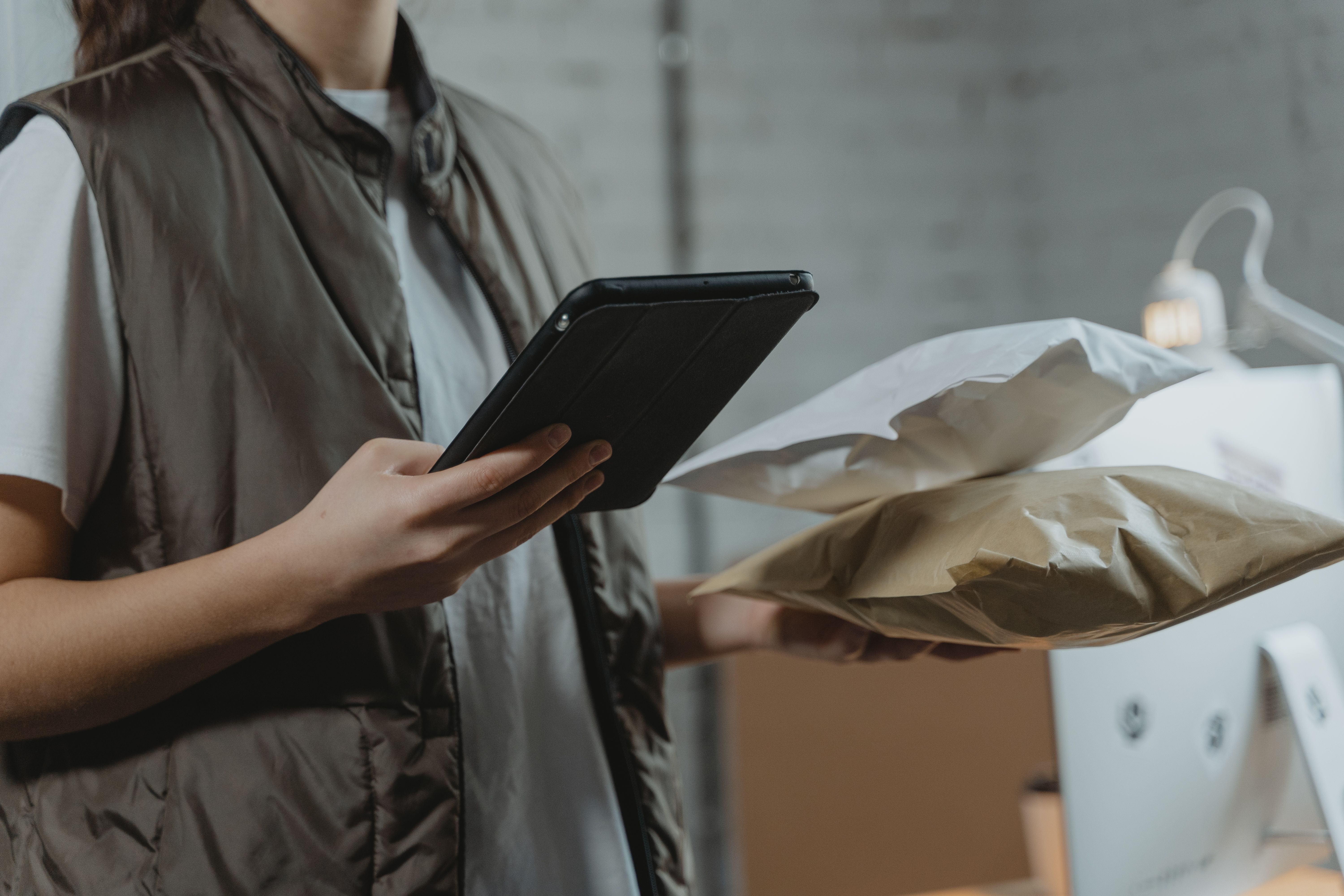 Consumer brand operator reviewing inventory and product shipments
