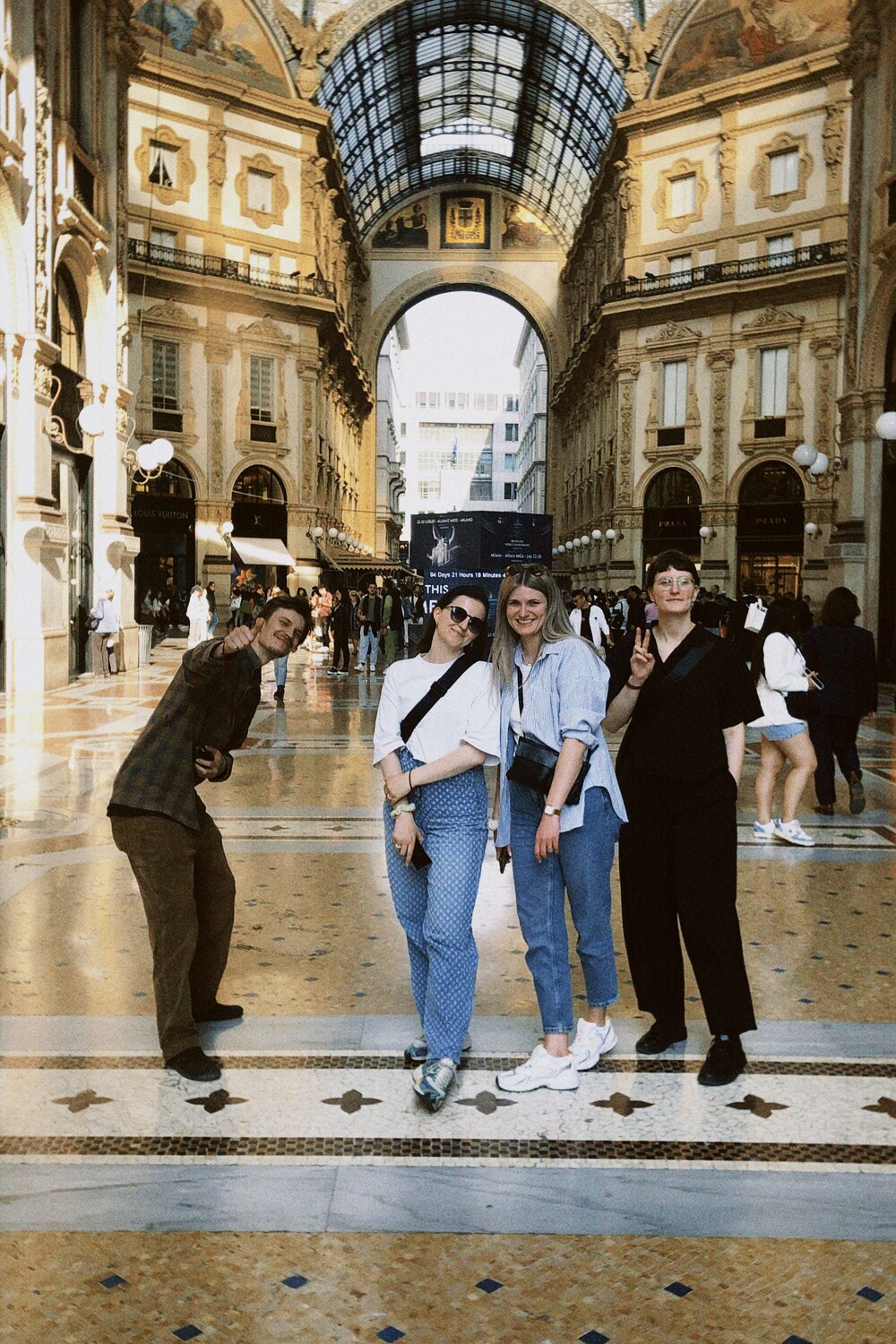 Designplus team posing in the Galleria Vittorio Emanuele II in Milan during Design Week
