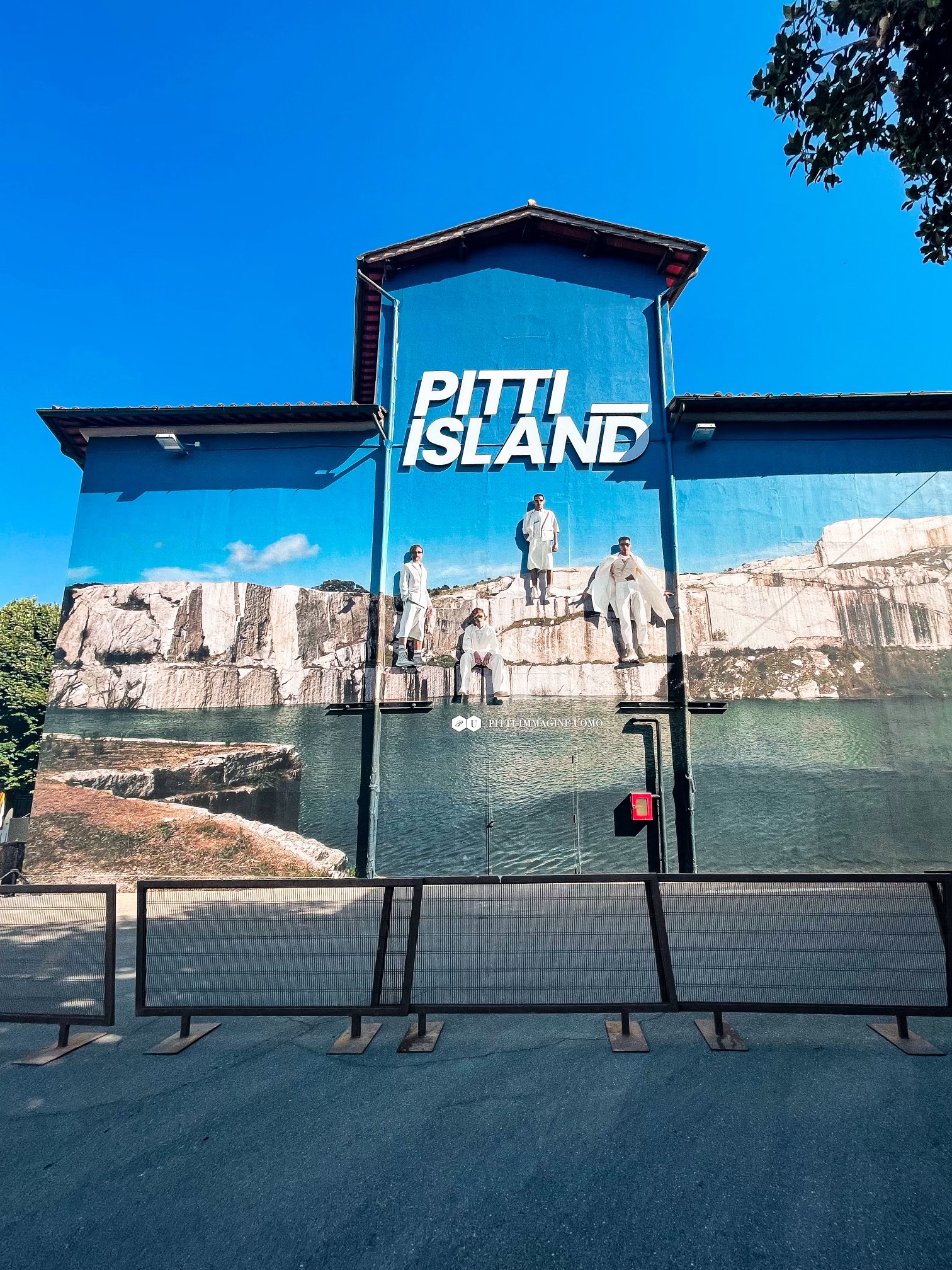 Facade with “Pitti Island” lettering and a quarry motif, Pitti Immagine Uomo in Florence