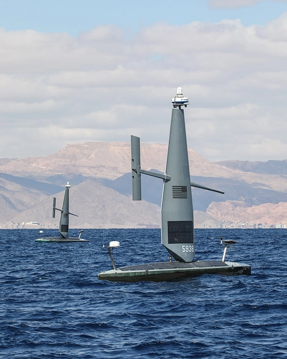 Two Saildrone Voyagers at sea during IMX 2025