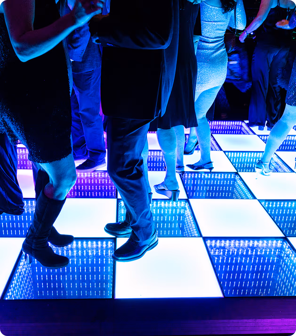 Guests dancing on a light-up LED dance floor