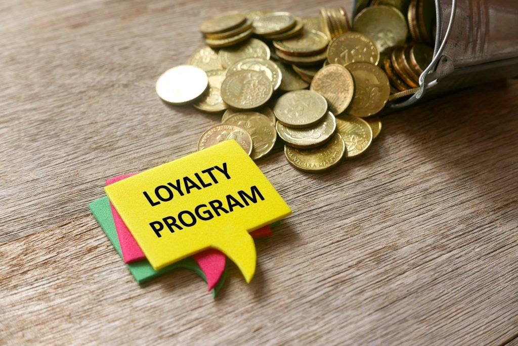 Loyalty program next to coins.