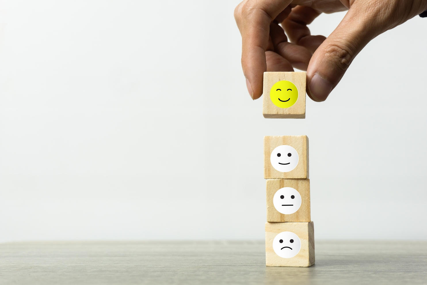 Alt: A person leaving a review, representing one way to increase user in-app engagement.