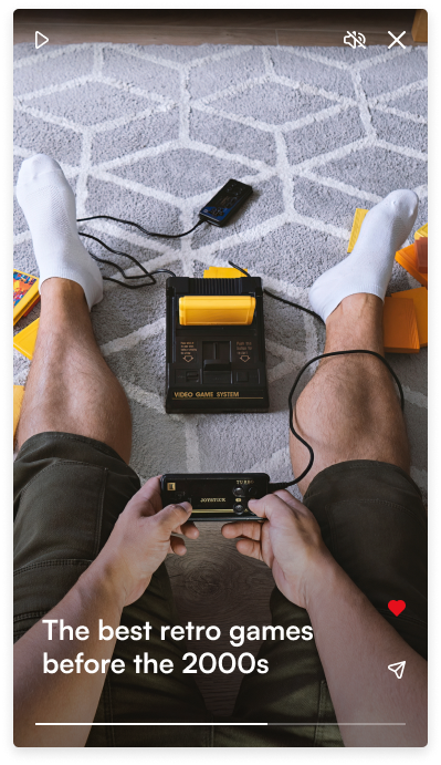 A retro gaming console with VHS tapes next to it.