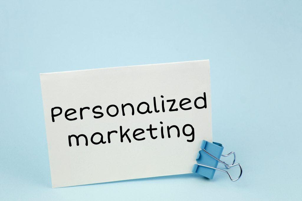 Personalized marketing written on a piece of paper.