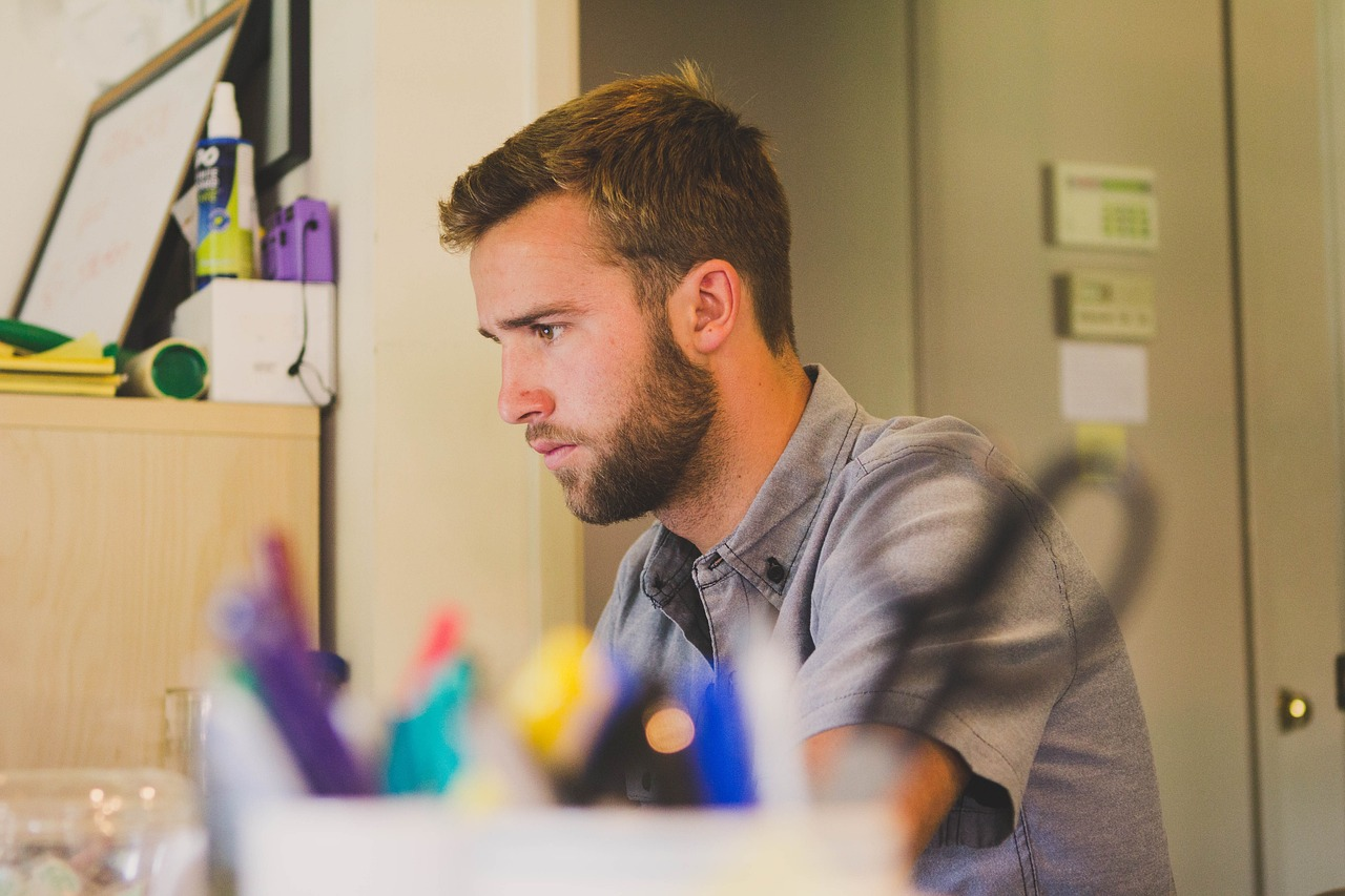 A person feeling frustrated while working