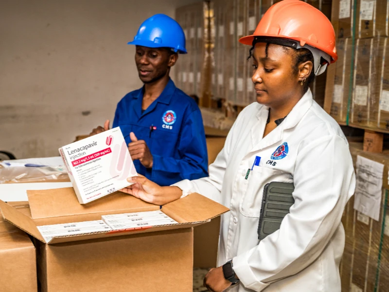 Photo of unboxing medical supplies of lenacapavir, the twice yearly injectable which is set to prevent millions of people in LMICs from HIV, in a factory.